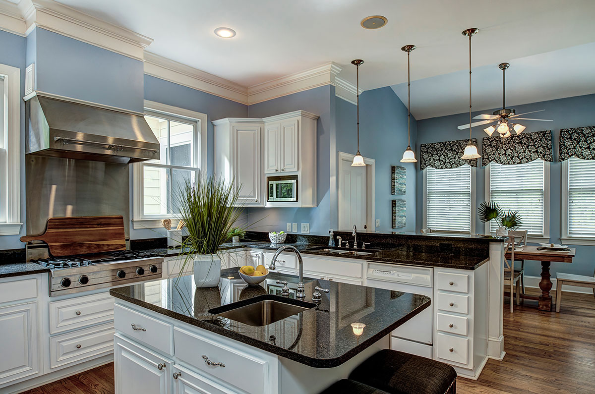 custom-kitchen-blue-walls-black-countertops